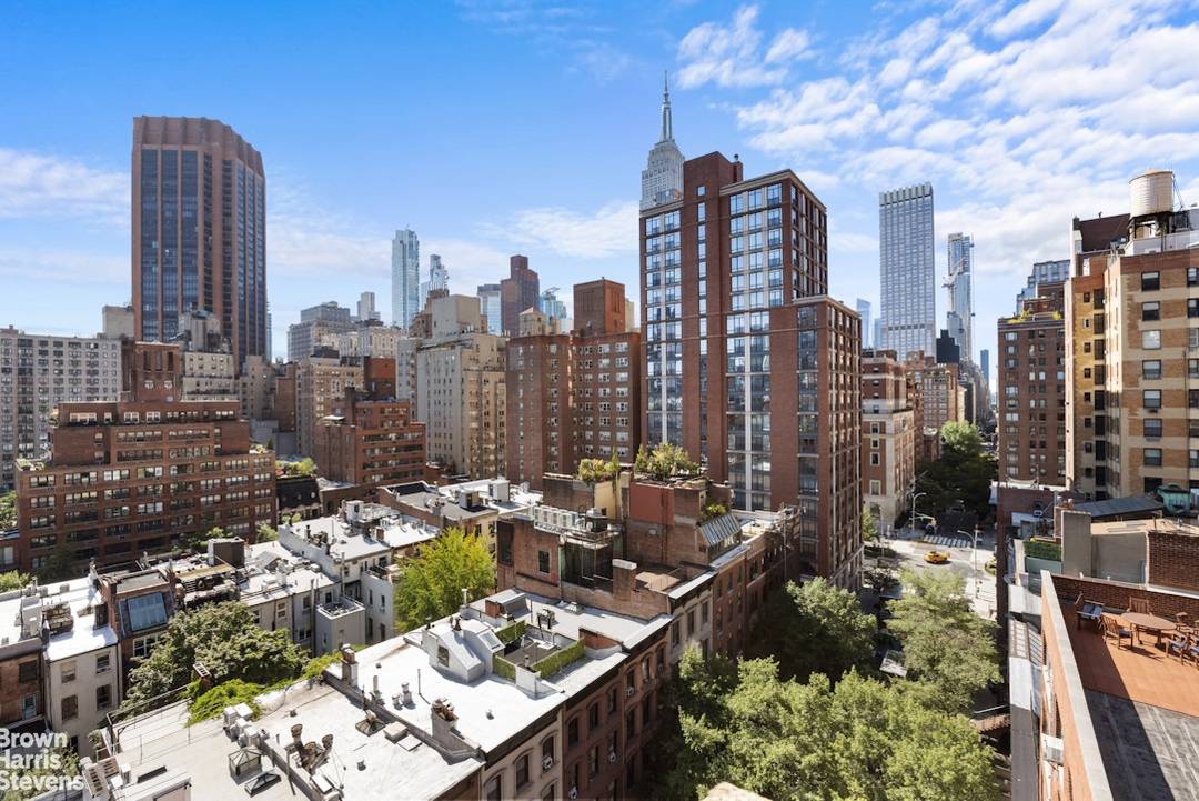 Charming, sunny, terraced one bedroom apartment with open south and west exposures for full city views in a full service pre war co op on a charming tree lined Murray ...