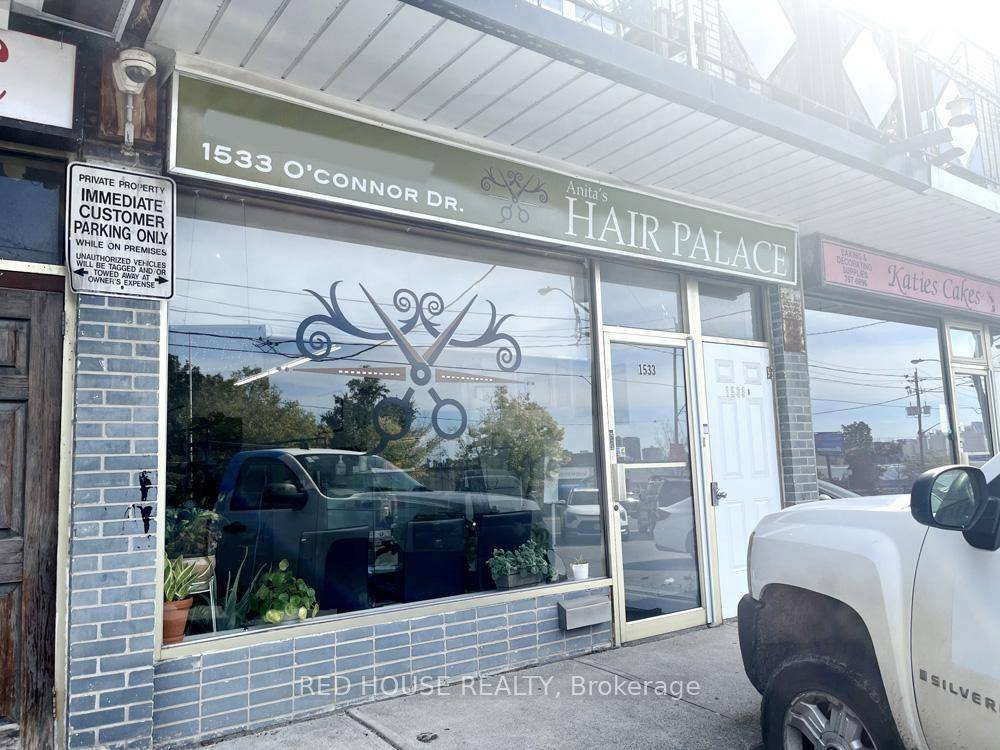 Excellent Opportunity to Own a Building with Two Residential Rental Units and a Commercial Main Floor Unit with Great Exposure on a Busy and Popular Street in East York.