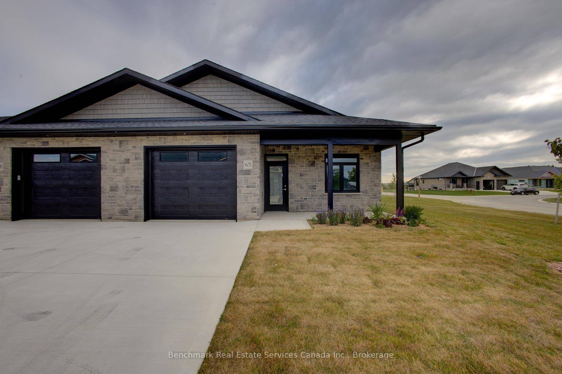 Welcome to easy, carefree living in this beautifully designed 2 bedroom, 2 bathroom end unit bungalow condo, nestled in the quiet and welcoming town of Ripley.