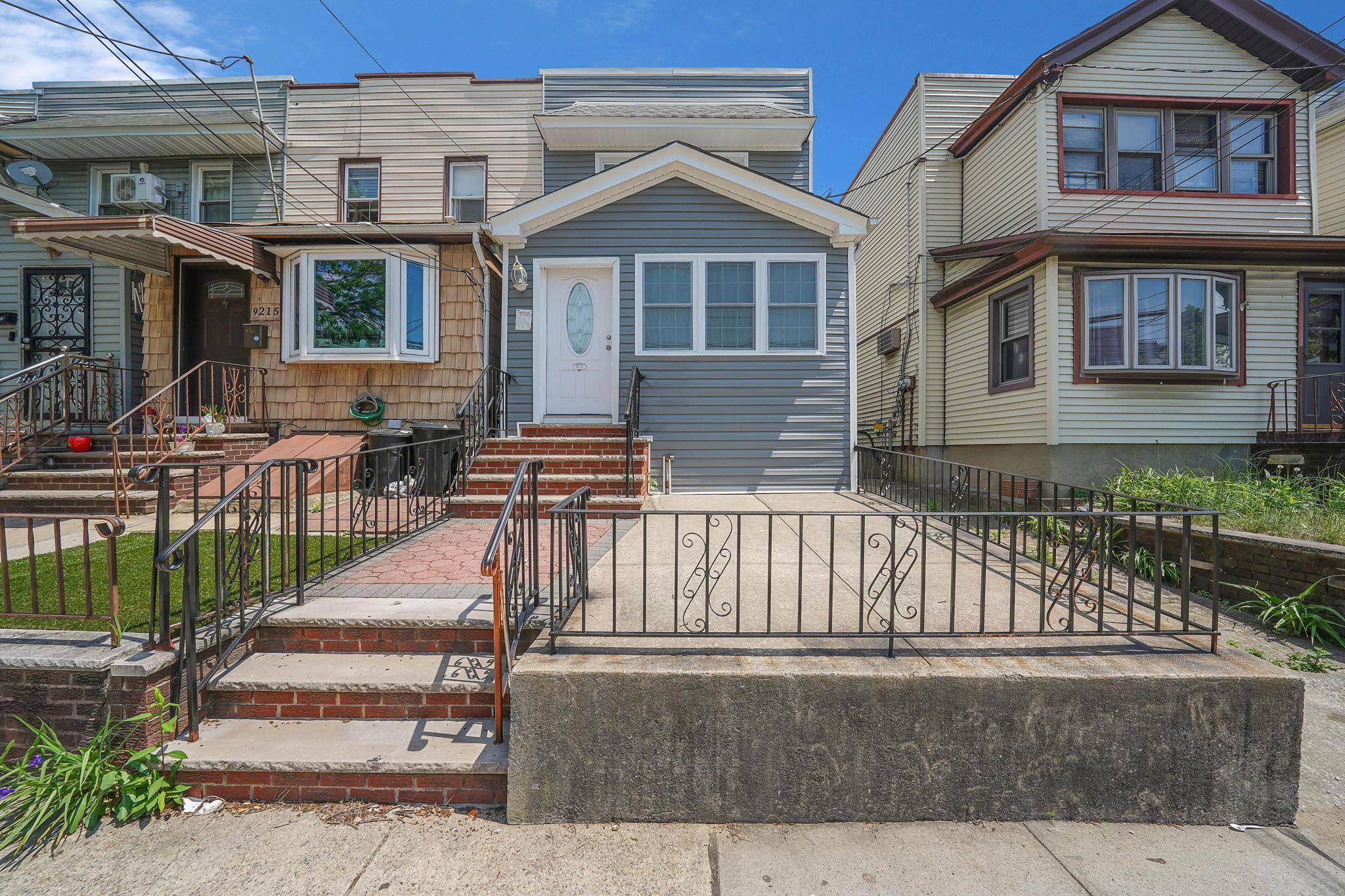 Come Experience This Stunning Renovated Two Family Home !
