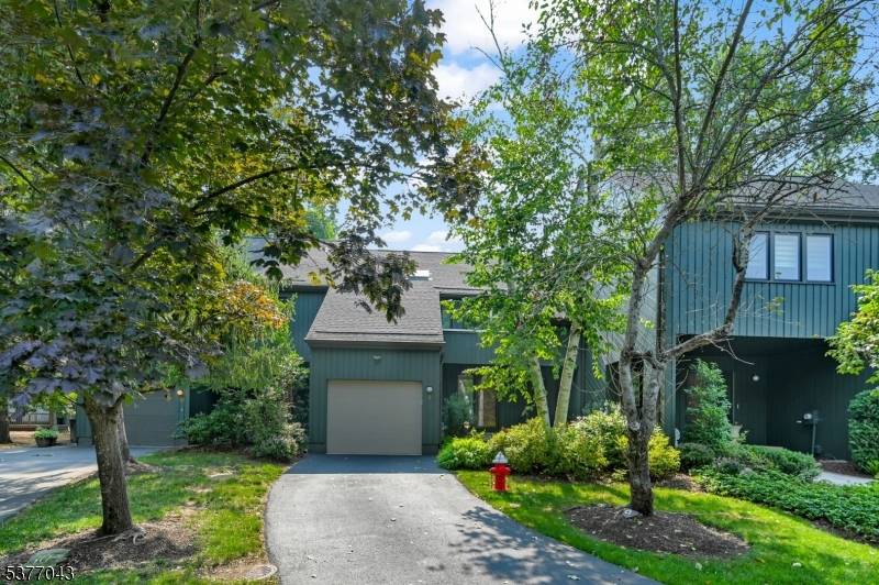 Beautifully decorated, this upscale townhouse in desirable Windmill Pond is everything you have been searching for !