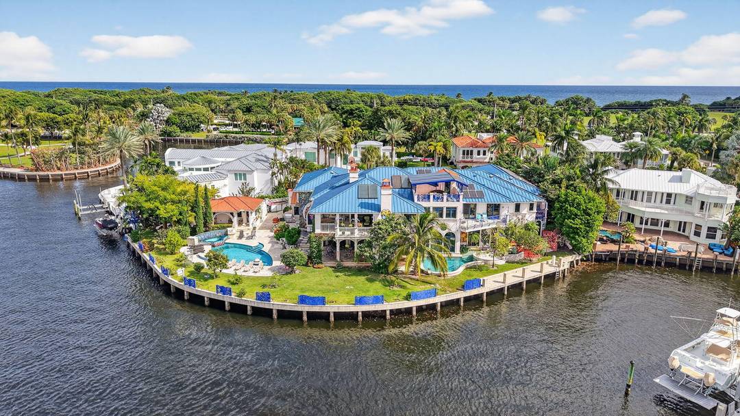 PRIME LOCATION ! Exceptional crown jewel, DEEPWATER Intracoastal Estate nestled on a Barrier Island, quiet Cul De Sac surrounded by other trophy properties.