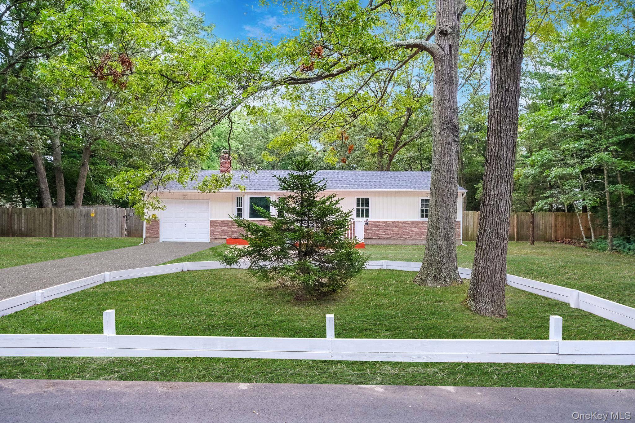 Welcome to this stunning fully renovated ranch, offering 3 spacious bedrooms and 2 beautifully updated full bathrooms, including a private en suite in the primary bedroom.