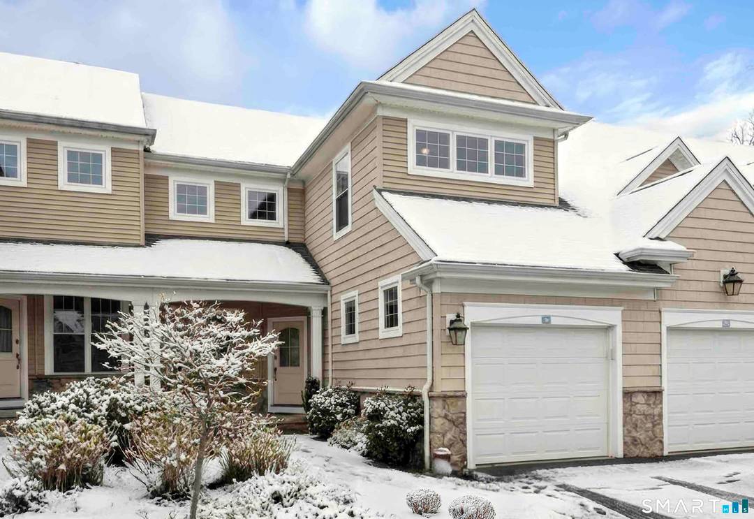 Rarely Available This superbly crafted shingle and stone townhome offers upscale amenities with maintenance free living.