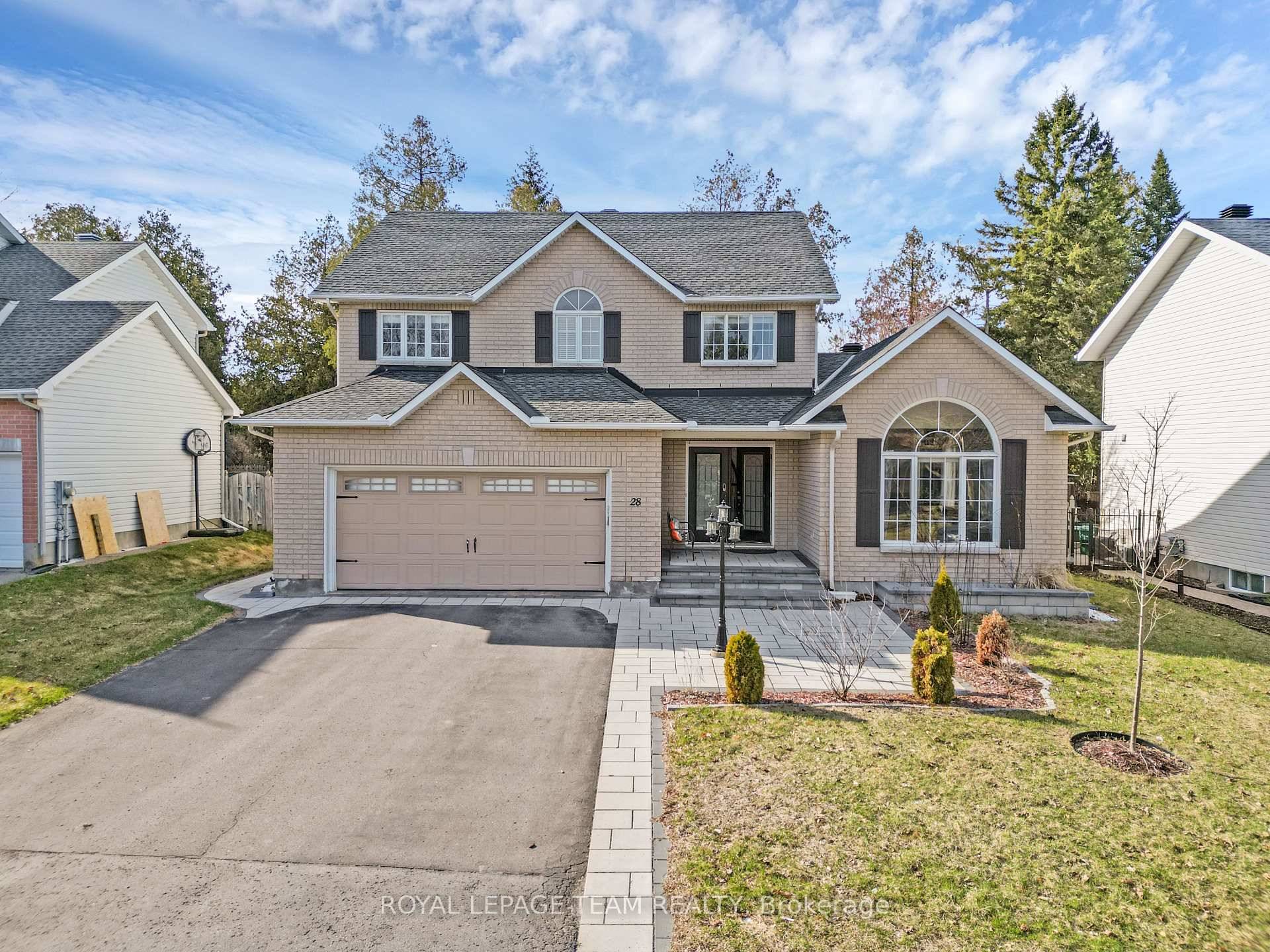 65ft WIDE LOT approx. A true showstopper in Crossing Bridge Estates !