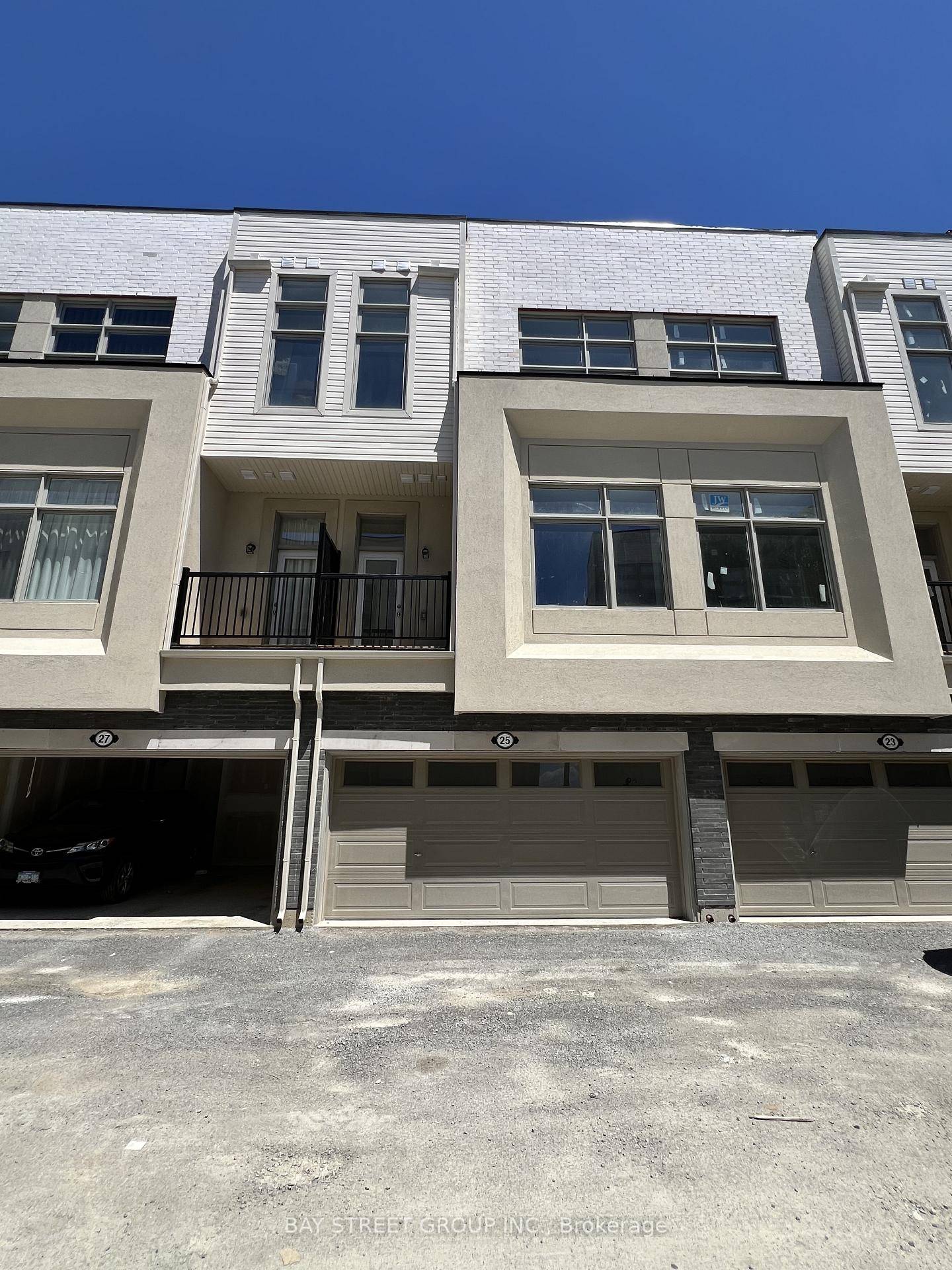 One Year Old Luxury Modern Townhouse with Double Garage in the Prestigious Cachet Community !