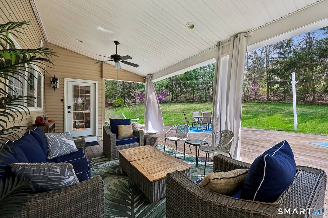A refined blend of scale, light, and modern comfort, this exceptional Danbury residence is set on 2.