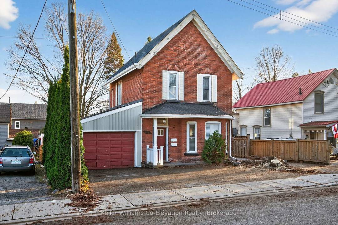 Charming upper level unit in a beautiful brick century home !