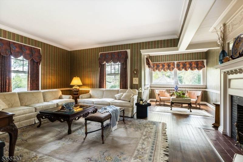 Stately colonial situated in historic Nutey, greeting you with the presence of days past.