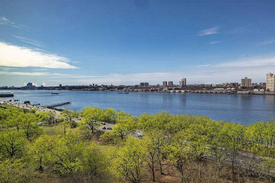 Perched high above Riverside Drive, this beautifully appointed three bedroom, two and a half bath residence offers sweeping panoramic views of the Hudson River and Riverside Park.