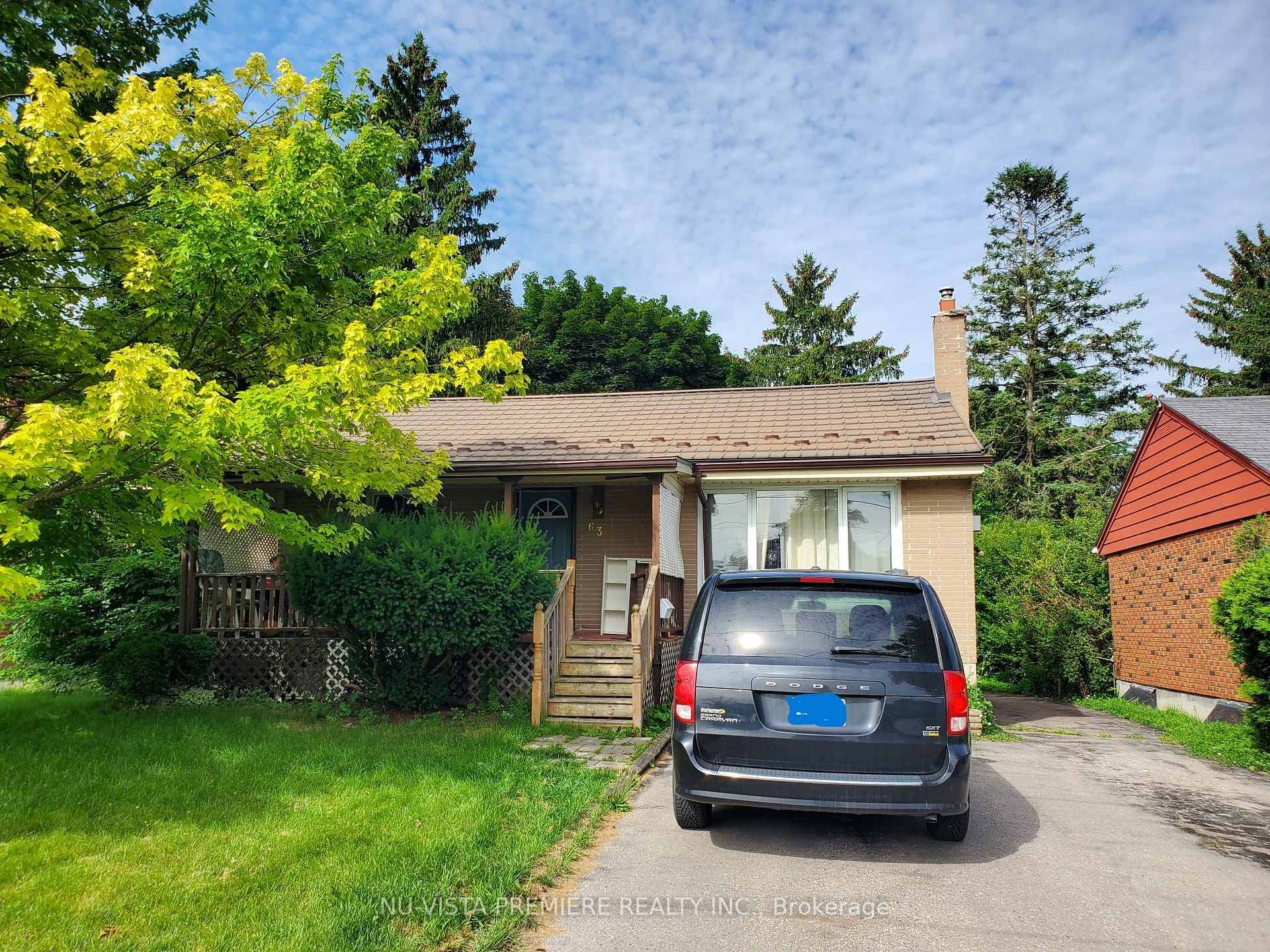 This beautifully renovated bungalow nestled on a huge lot.