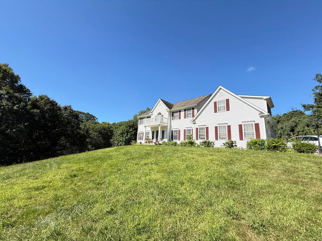 Set on a private 2 acre lot near Scoville Reservoir, this 4BR, 2.