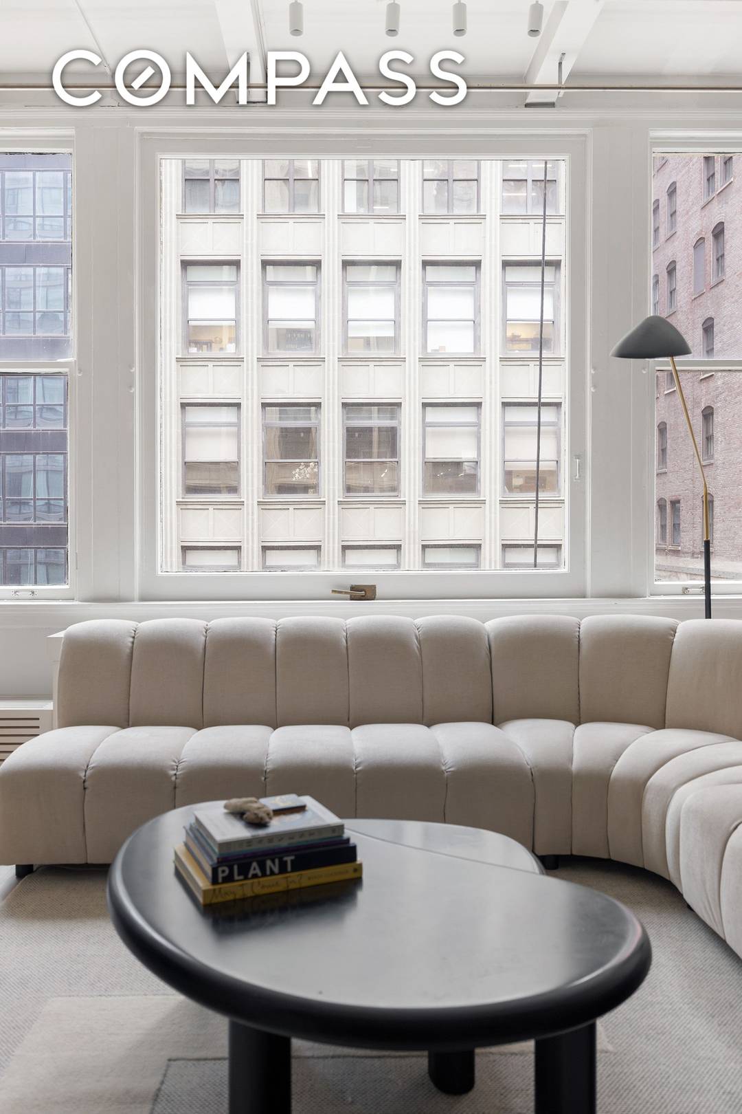 A meticulously renovated loft in a storied 1909 Art Deco cooperative, Residence 6E blends architectural pedigree with modern sophistication just moments from Bryant Park.