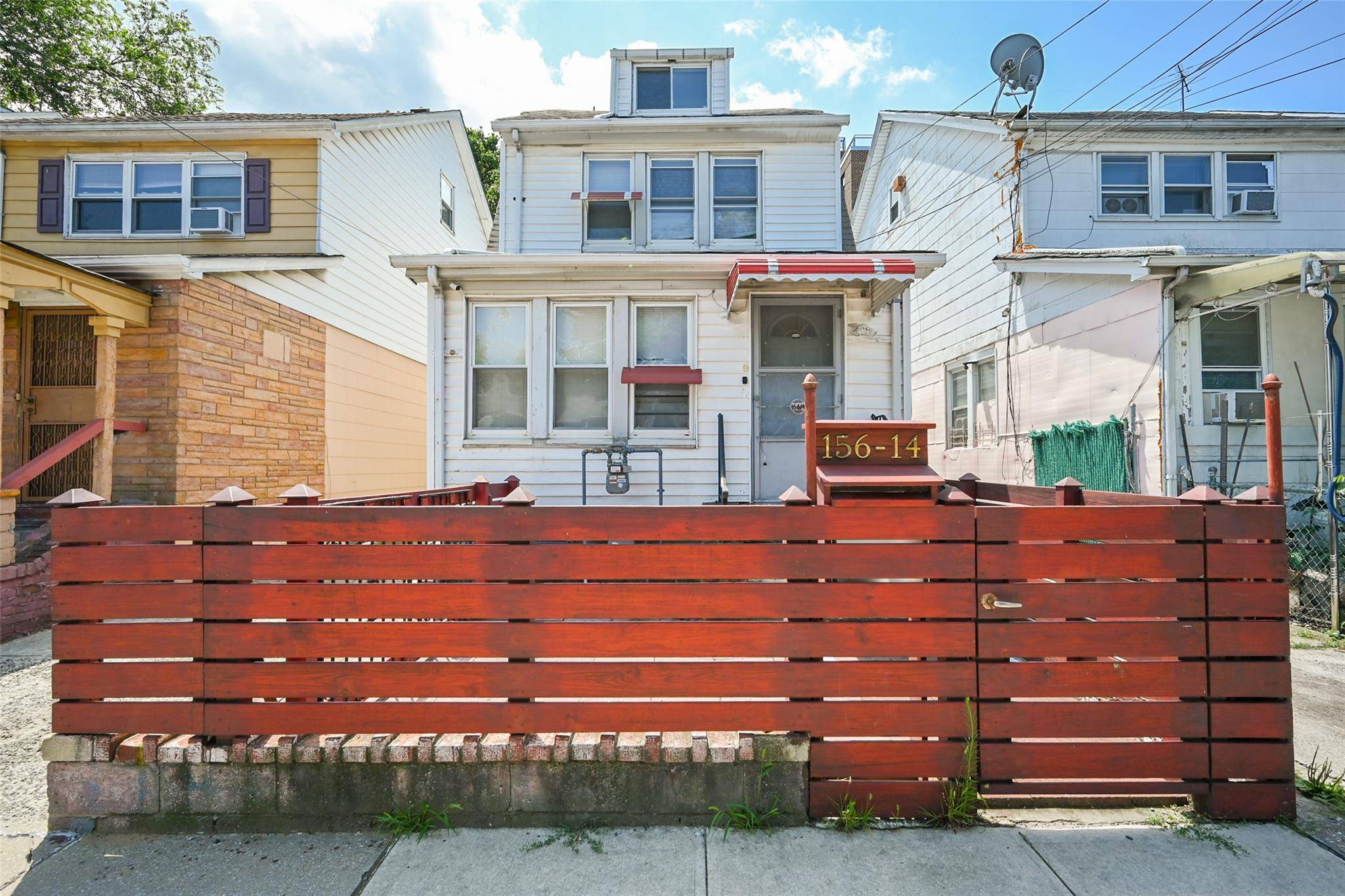 Prime Flushing Location Two Family Home with Private Driveway amp ; Garage !