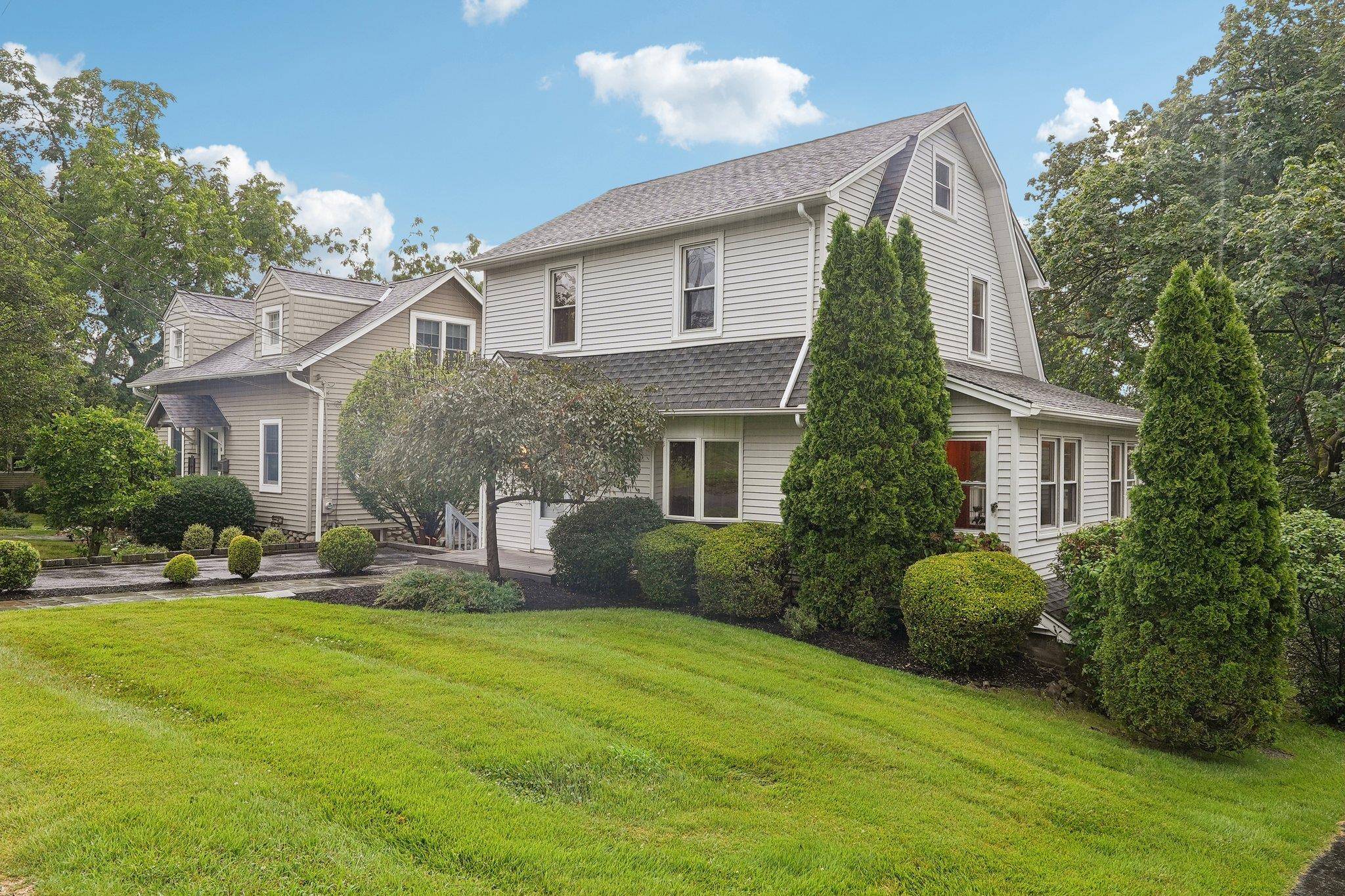 Welcome to this beautifully maintained 1930s 3 bedroom Colonial, nestled on a quiet and desirable street just minutes from shops, restaurants, parks, and top rated schools.