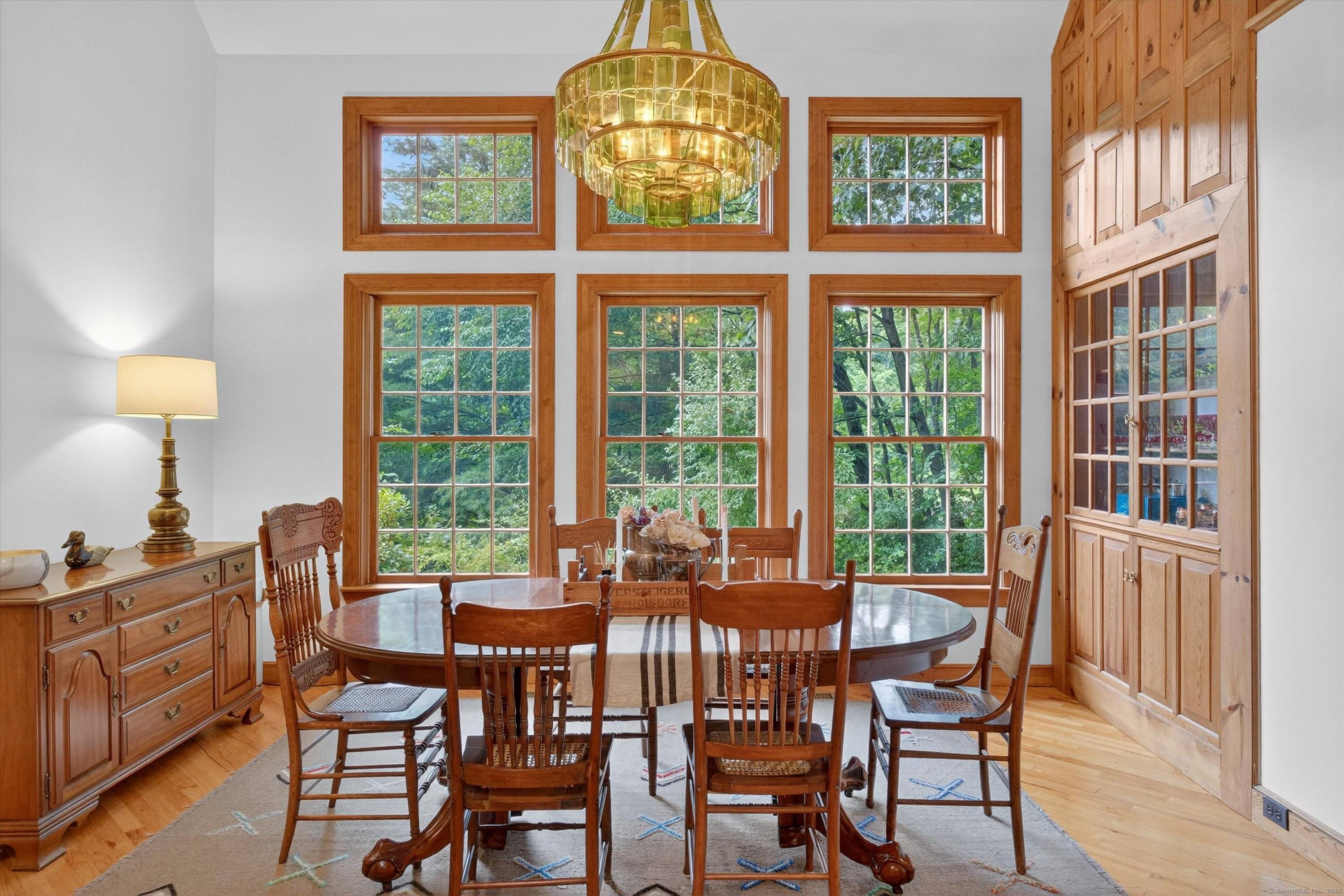 Welcome to 35 Poverty Hollow Road, an idyllic retreat nestled in southwest Newtown with sweeping views of the scenic Red Gate Farm.