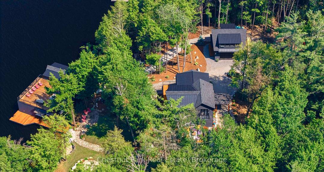Welcome to an extraordinary retreat on coveted Taylor Island, where timeless design meets luxurious Muskoka living.