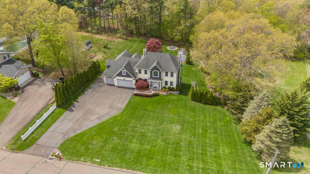 Set on just under an acre of beautifully manicured, lush green grounds, this expansive 3, 091 sq ft home offers the perfect blend of space, flexibility, and comfort in a ...