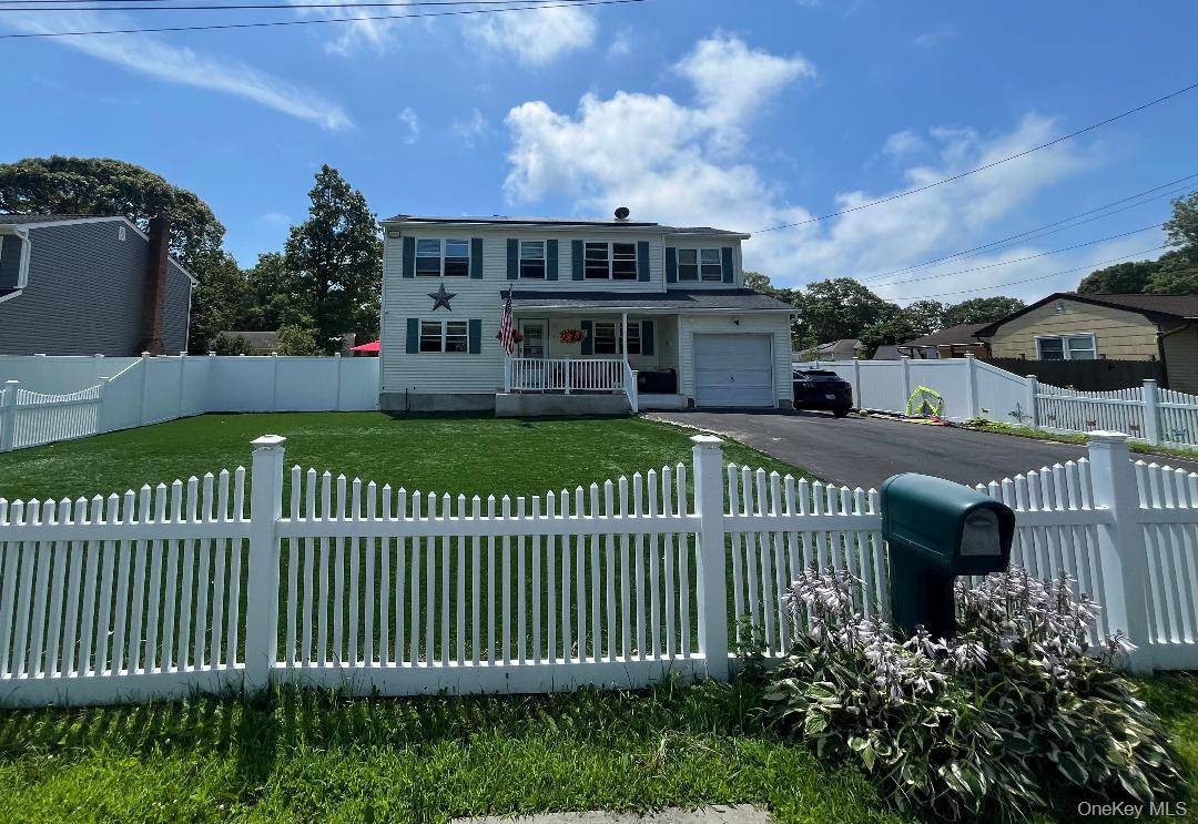 Looking for a spacious and versatile colonial with room for everyone ?