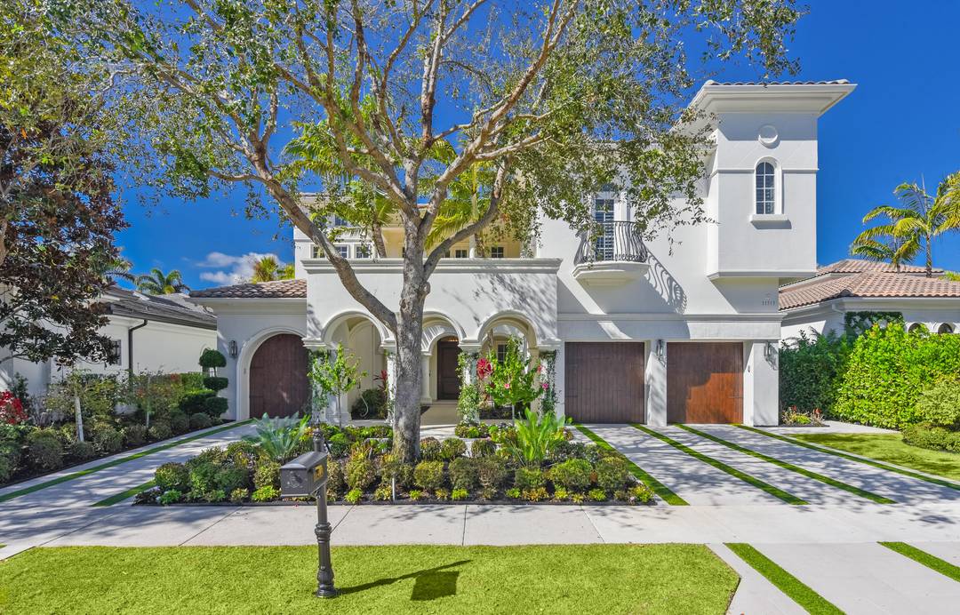 Welcome to this beautifully renovated Sarimento model in the exclusive Old Palm Country Club.