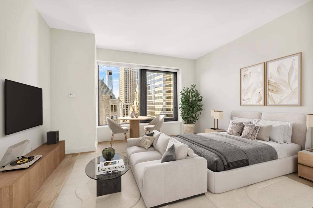 Motivated Seller Step into this bright and airy studio, where natural light pours in through oversized windows, framing stunning views of the Financial District and the East River.