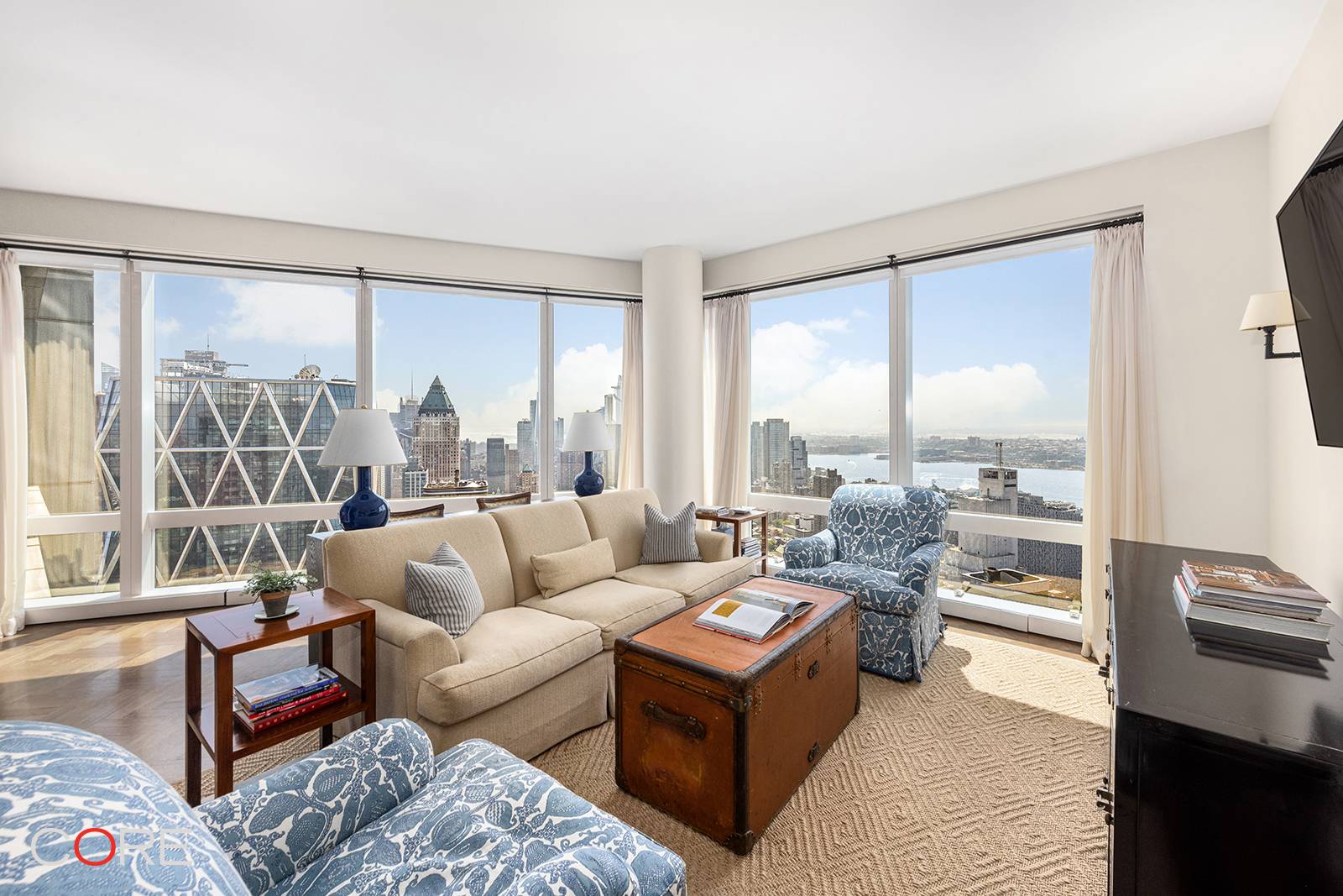 Enjoy panoramic sunset and river views from Residence 69E at 25 Columbus Circle, one of the most coveted addresses in New York City.