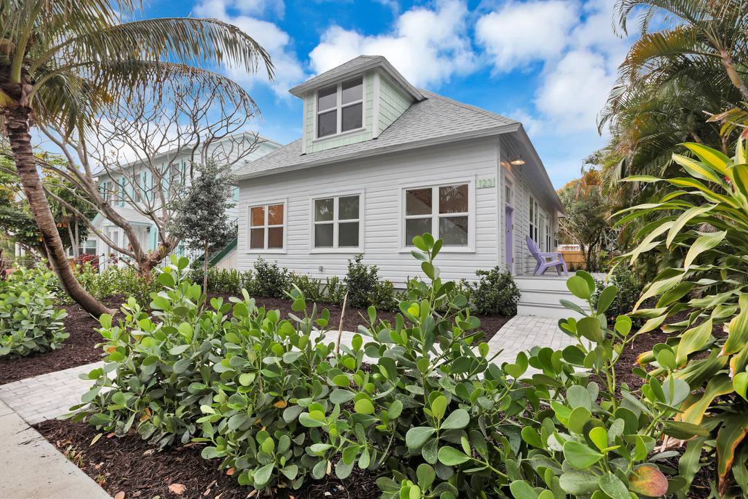 Modern coastal living meets historic charm and timeless beauty at 123 S Ocean Breeze.