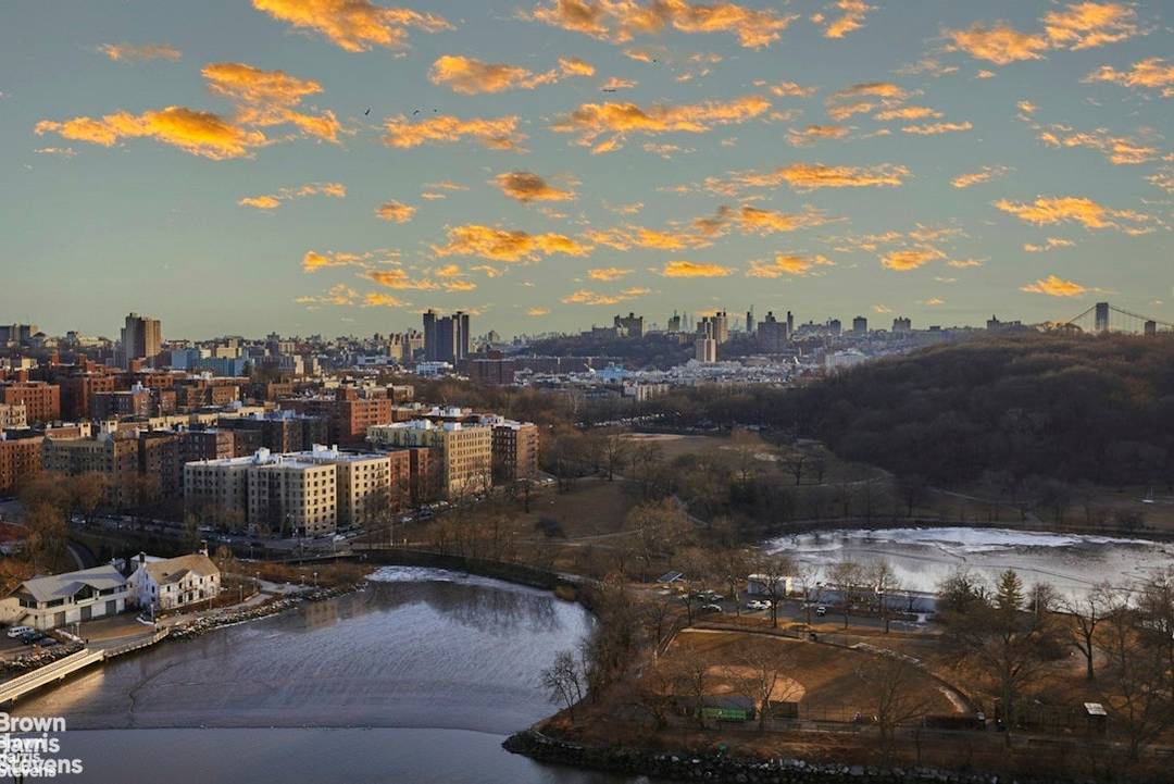 Immerse yourself in spectacular river views from every window of this south and east facing corner two bedroom, two bath apartment, complete with a private terrace.