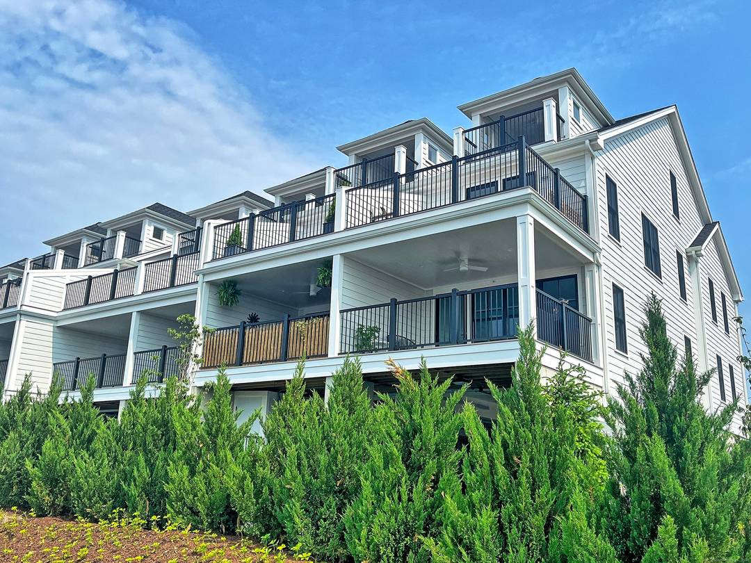 Built in 2023, this luxury waterfront condo offers panoramic water views and stunning sunsets from every deck across all three levels.