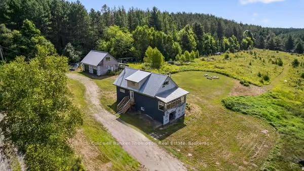 Escape to your own private retreat on over 14 acres of picturesque land featuring a serene pond and endless opportunities for outdoor adventure.