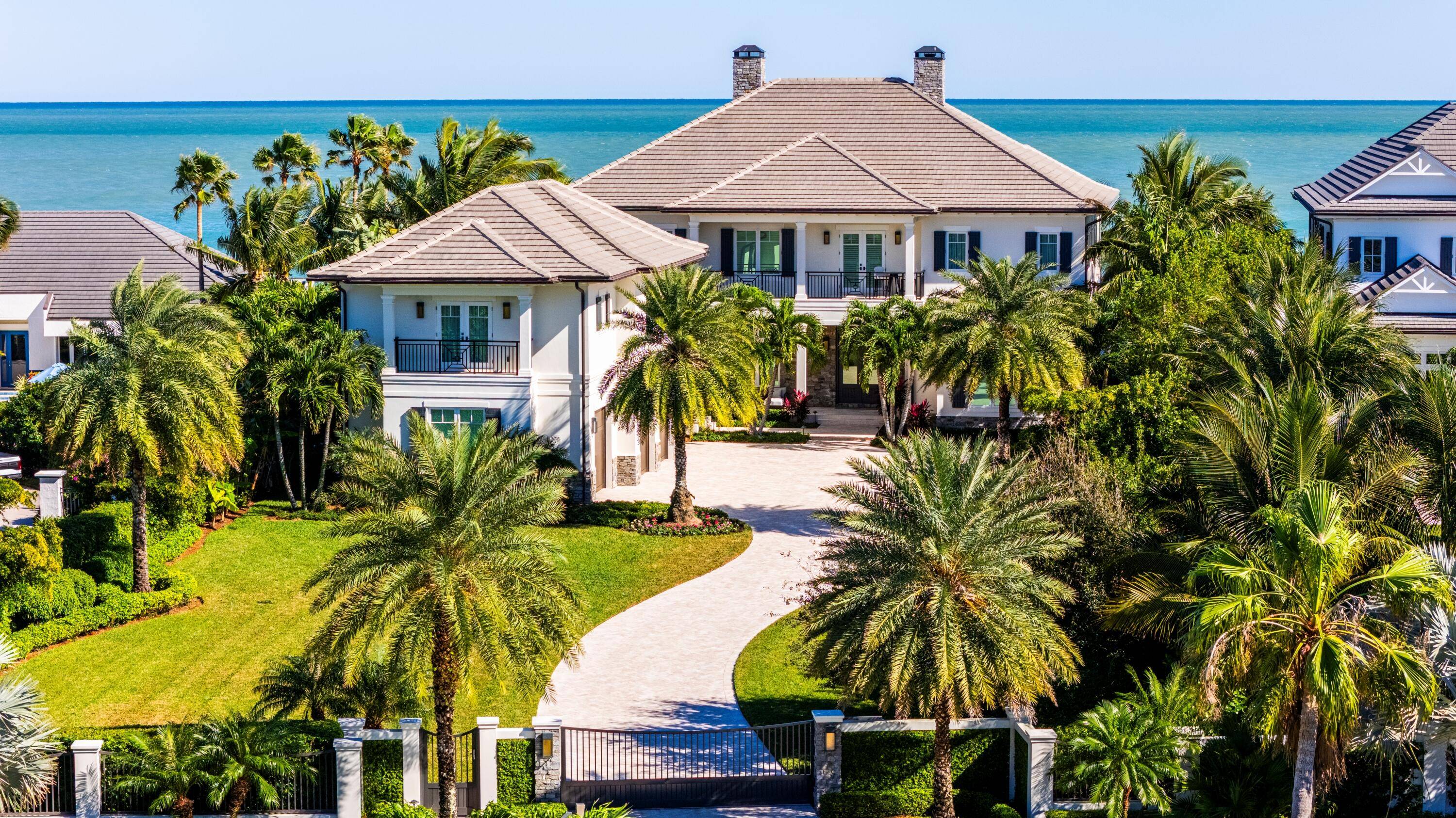 Stunning gated West Indies inspired 2 story, 5 BD, 5.