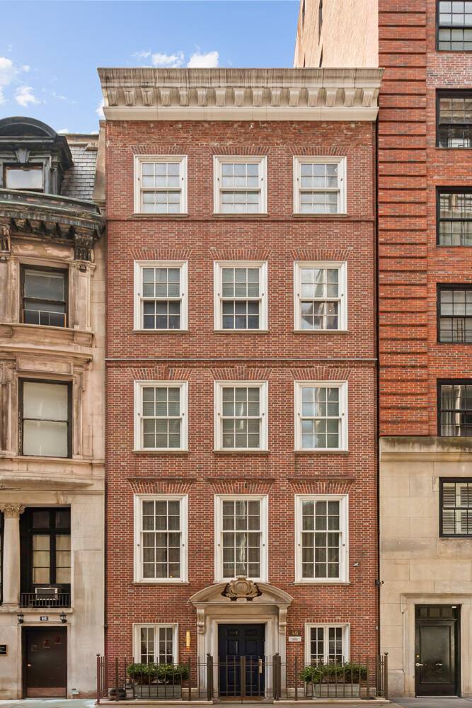 This exceptional over 20 foot wide townhouse is discreetly positioned on one of Manhattan's most prestigious blocks, between Madison and Park Avenues on the Upper East Side.