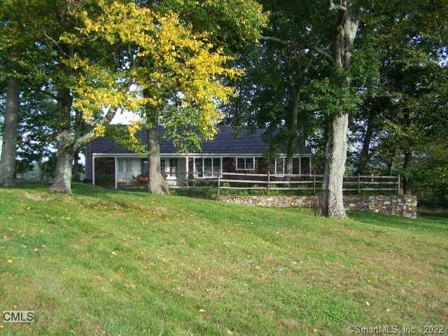 Charming mint renovated Nantucket style cottage set on 25 acres of meadows with apple trees and 200 year old maples.