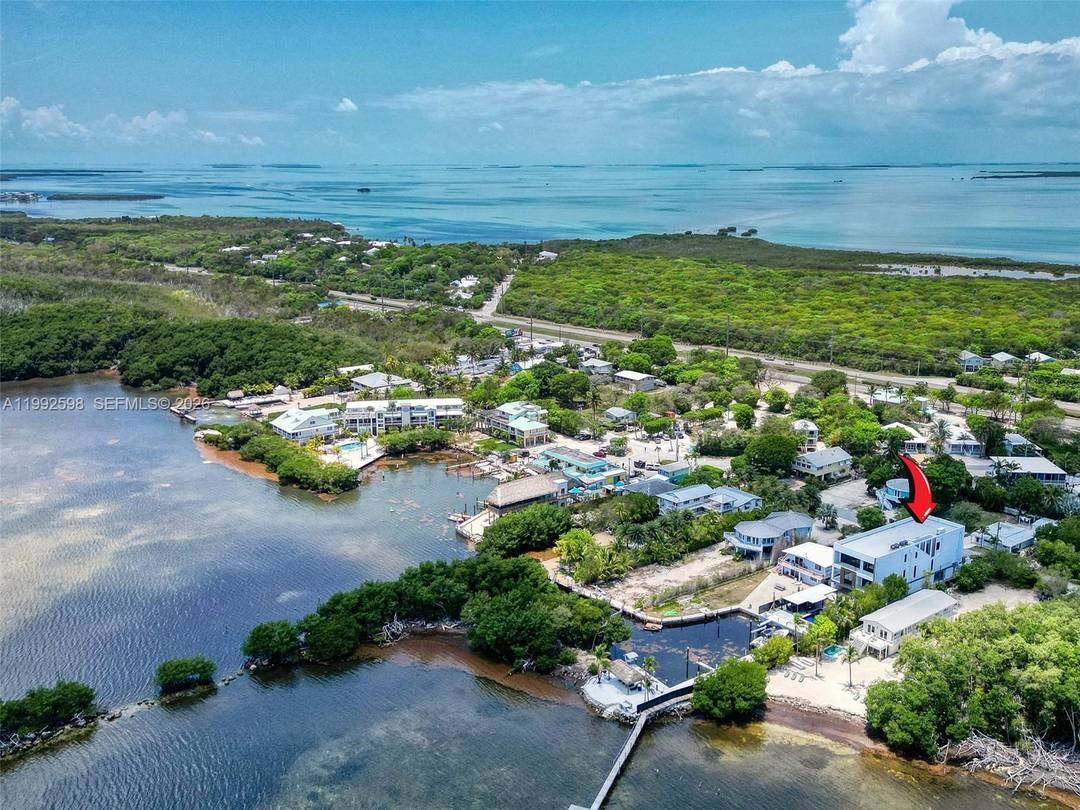 Welcome to 16 Seaside, an exceptional oceanfront estate offering modern design, premier boating, and investment versatility just one hour from Miami.