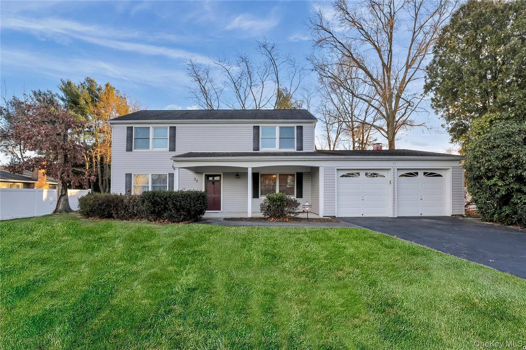 Welcome home to The Cambridge Colonial, nestled in the highly desirable Stony Brook M Section and located within the award winning Three Village School District.