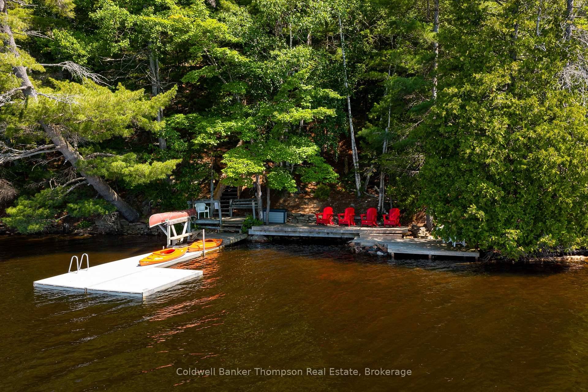 Nestled at 148 Golden Pheasant, this stunning turnkey property offers unparalleled access to the serene waters of Fairy Lake, with over 40 miles of boating through Huntsville's picturesque lake system.