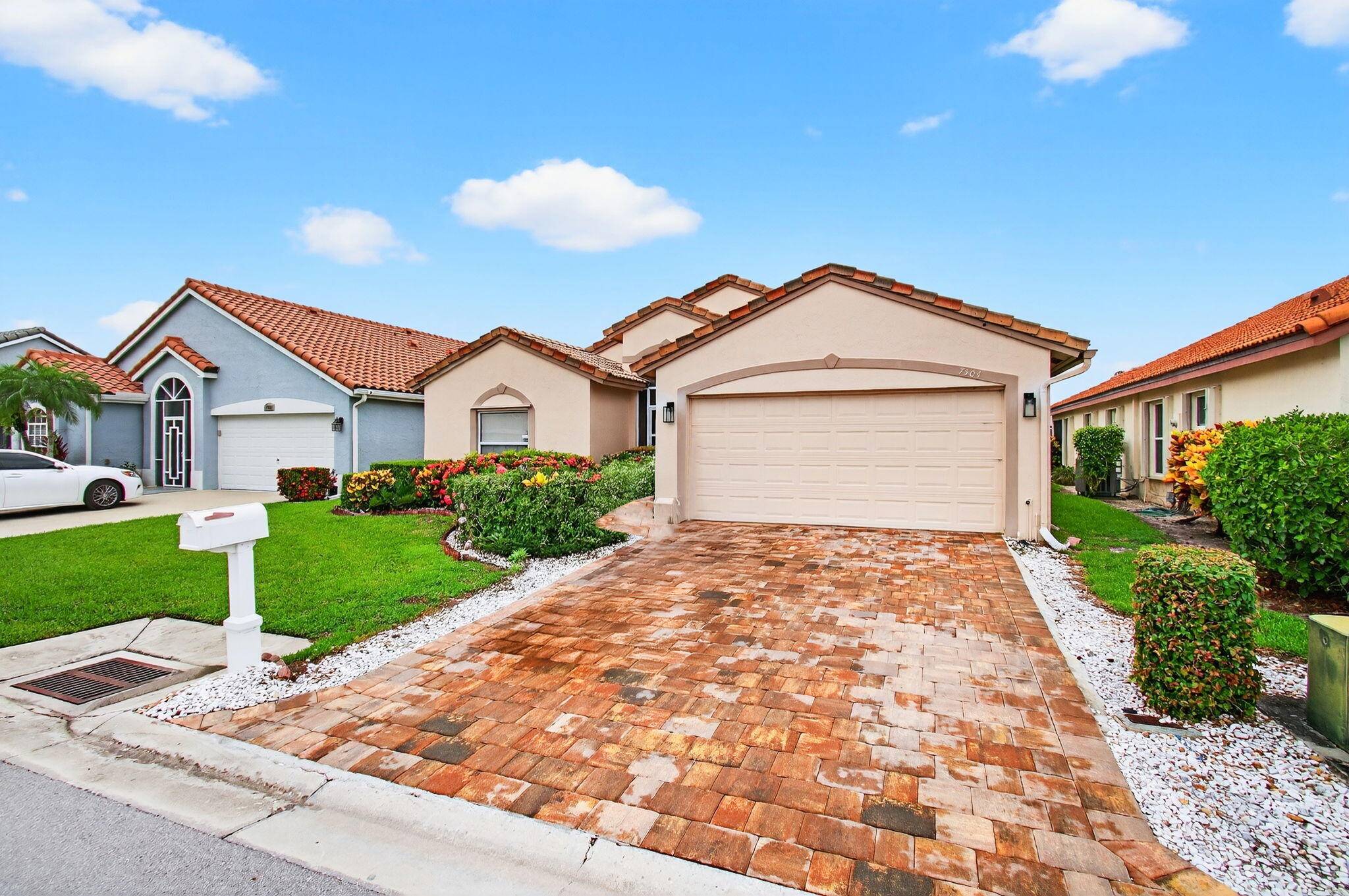 Welcome to 7504 Stirling Bridge Boulevard N, a well situated property in the lively neighborhood of Newport Cove, Delray Beach, Florida.