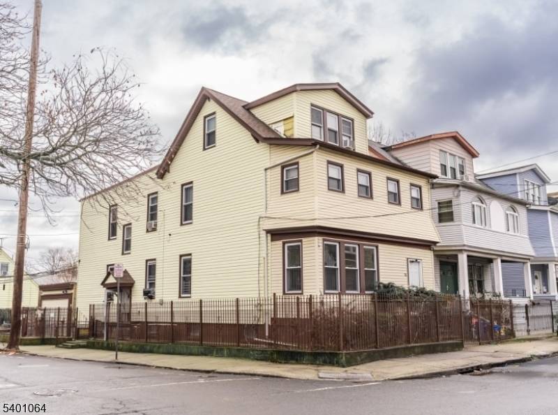 Well maintained two family property featuring two separate apartments, each offering 3 bedrooms and 1 full bathroom with spacious layouts.