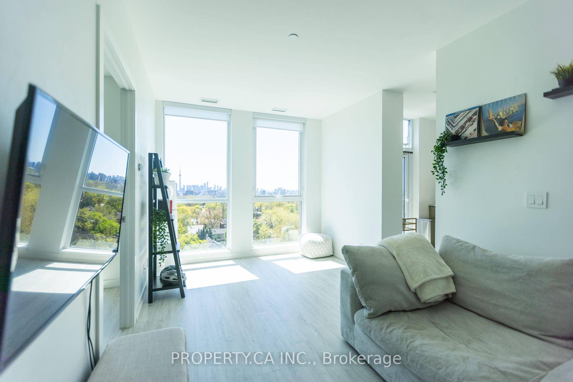 Must See ! Ultra Bright, Incredible Unobstructed South View, 9 Foot Smooth Ceilings, Floor To Ceiling Windows, New Flooring, and Balcony.