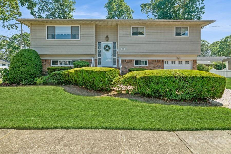 Potential in the Park... Your search is over to purchase a spacious Hi Ranch home on a beautifully landscaped 100 x 100 foot corner lot.