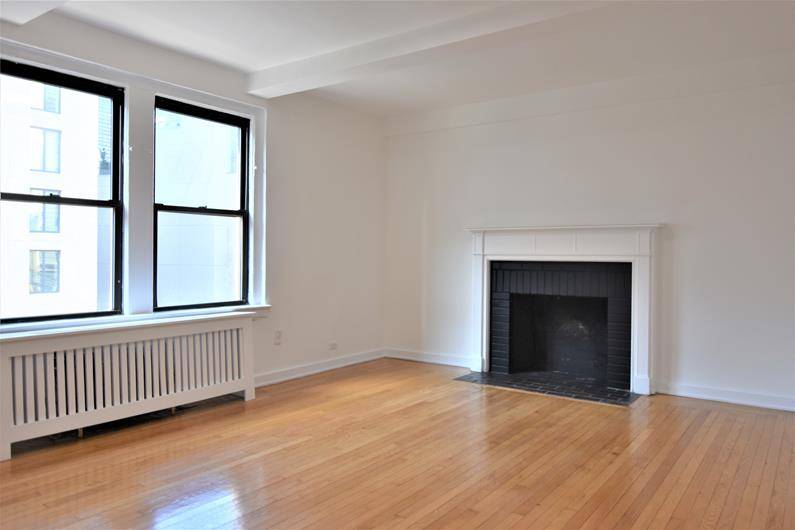 VILLAGE 1 BR WITH WOOD BURNING FIREPLACEThe quintessential prewarLarge and sun drenched with both west and eastern exposuresBeautiful prewar details include hardwood floors and high beamed ceilings, making this a ...