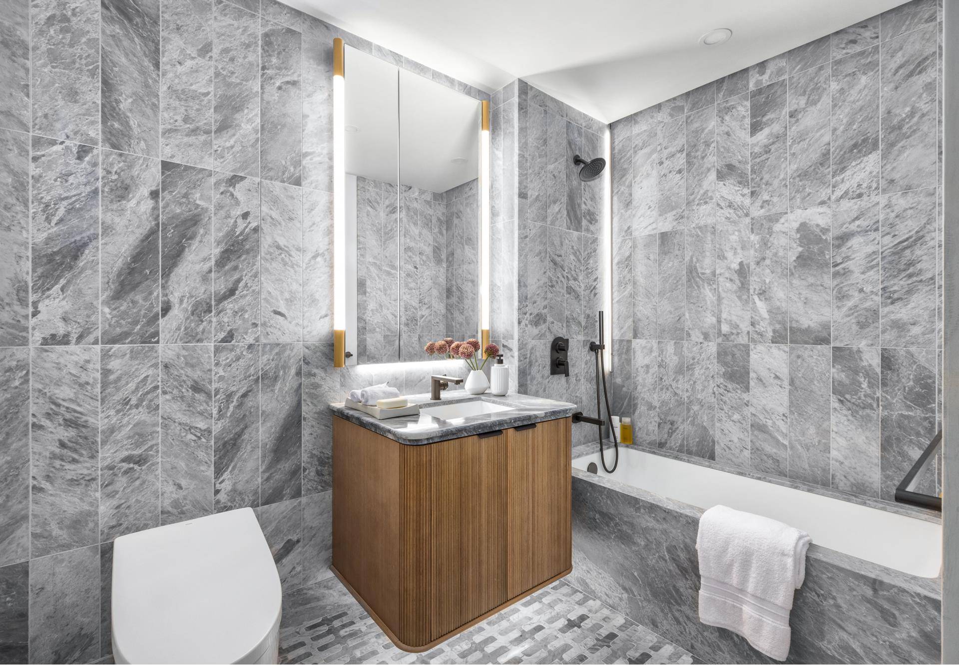 Residence 8A N is a thoughtfully crafted two bedroom, two bathroom home offering spanning 935 interior square feet.