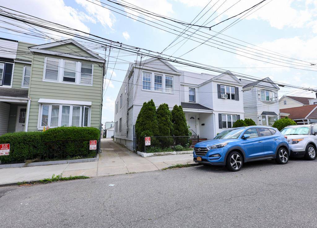 Turn Key 2 Family Home with 2 Car Garage Prime Location Near Transit, JFK amp ; Resorts World Ideally located on a quiet, tree lined street in the heart of ...