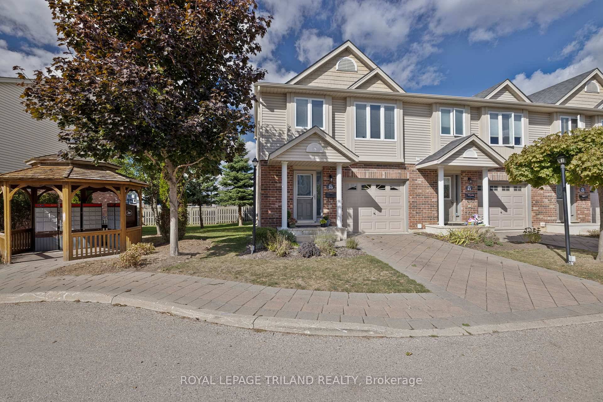 Welcome to 1625 Purser Street, Unit 39, a stylish multi level end unit condominium in Northeast London's sought after Wyngate community by Rembrandt Homes.