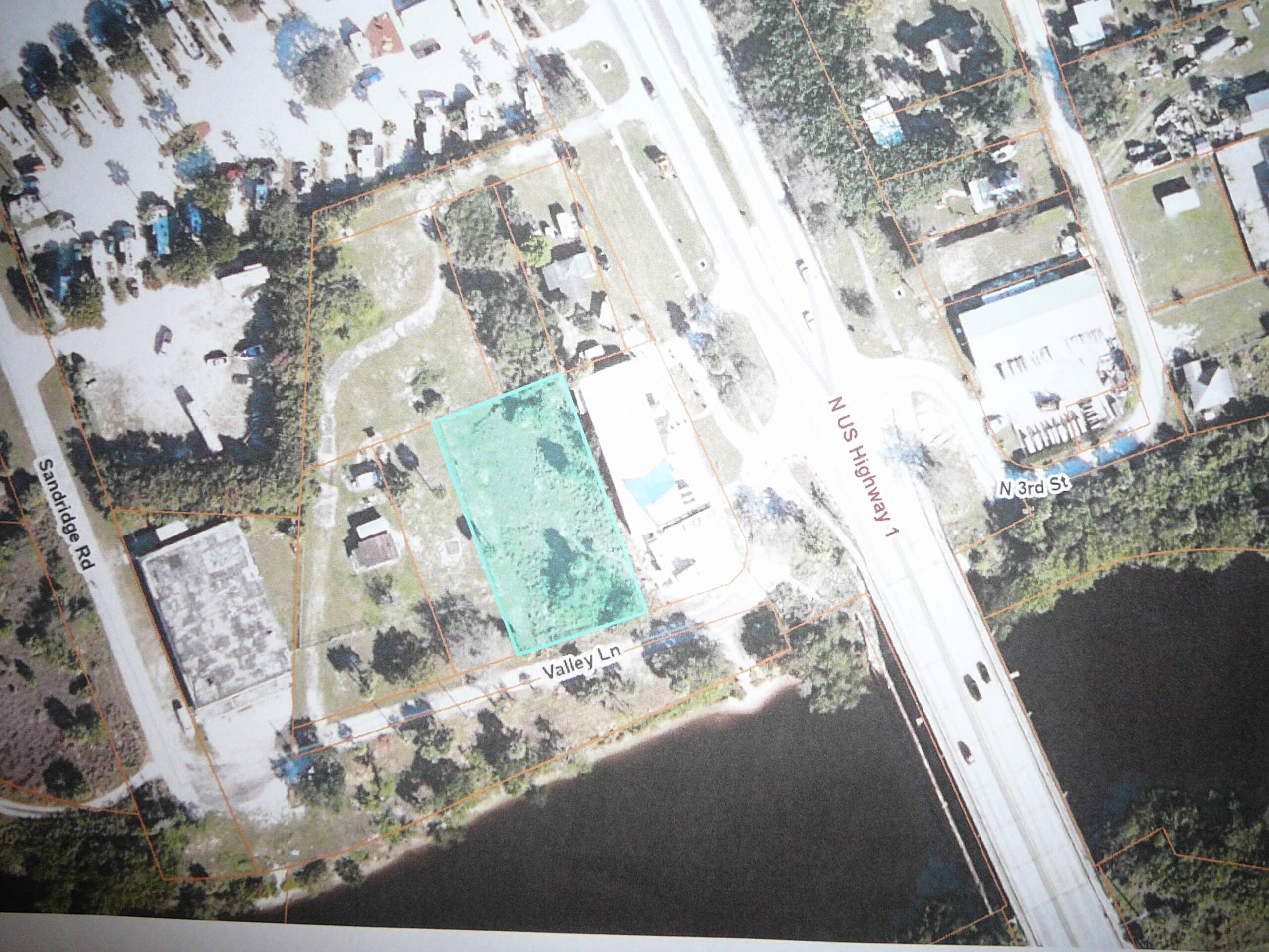 TWO COMMERCIAL PARCELS TOTALING.