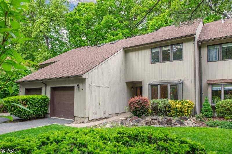 Experience the best of the Mountain Lakes lifestyle in this sophisticated, low maintenance townhouse nestled in the sought after Pine Edge community.