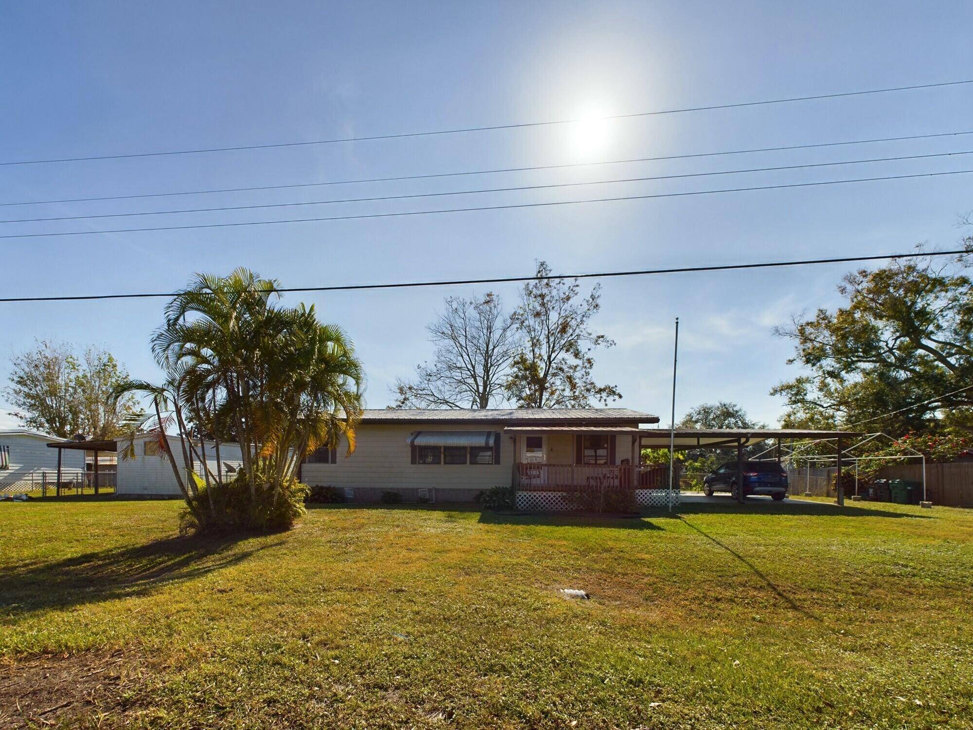 ! ! MOTIVATED SELLER ! ! This charming two bedroom, two bathroom manufactured home sits on two spacious lots with 150 feet of water frontage, offering direct access to Florida's ...