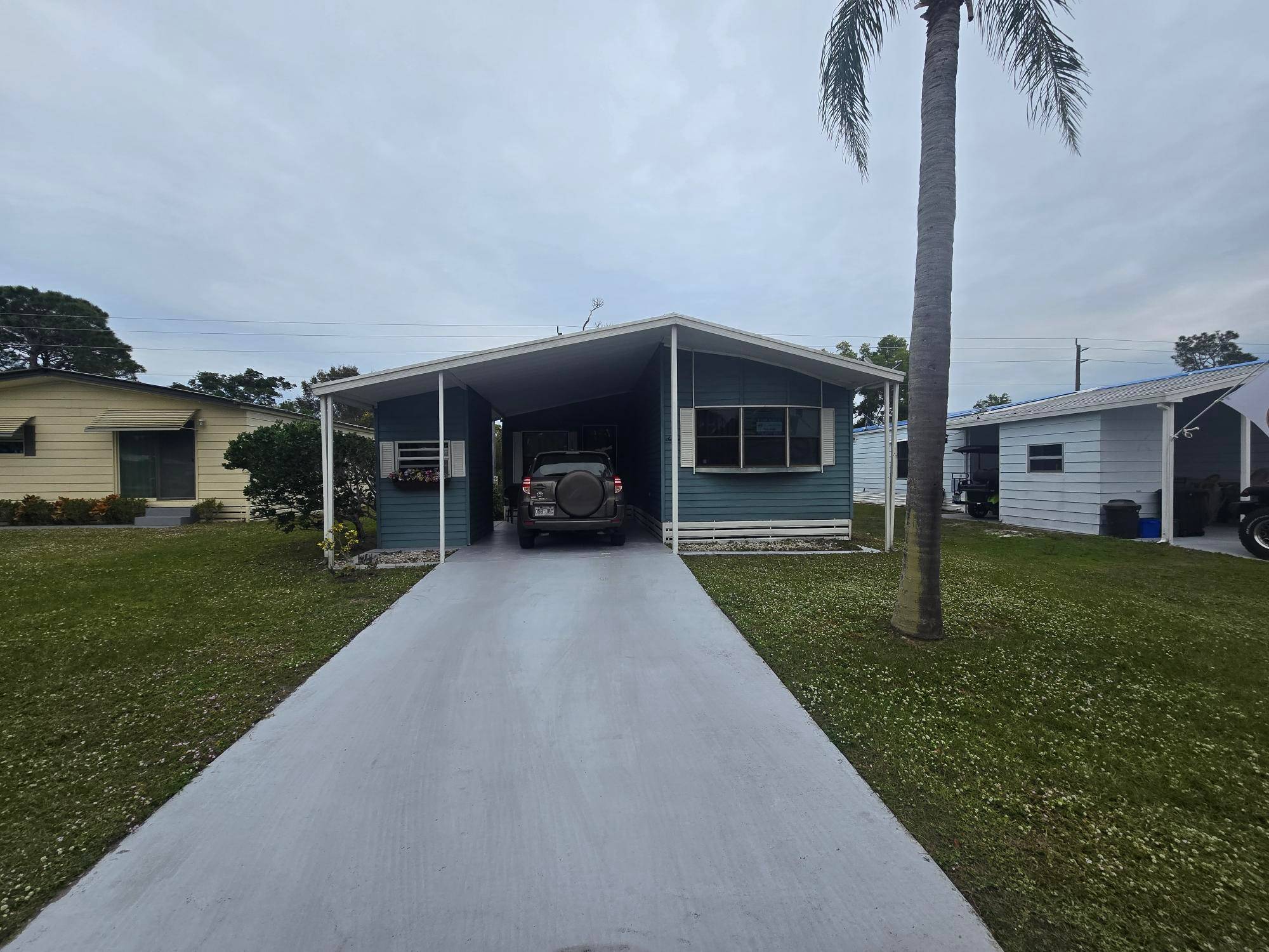Charming 2 bedroom, 2 bath home with large Florida room, eat in kitchen and dining.