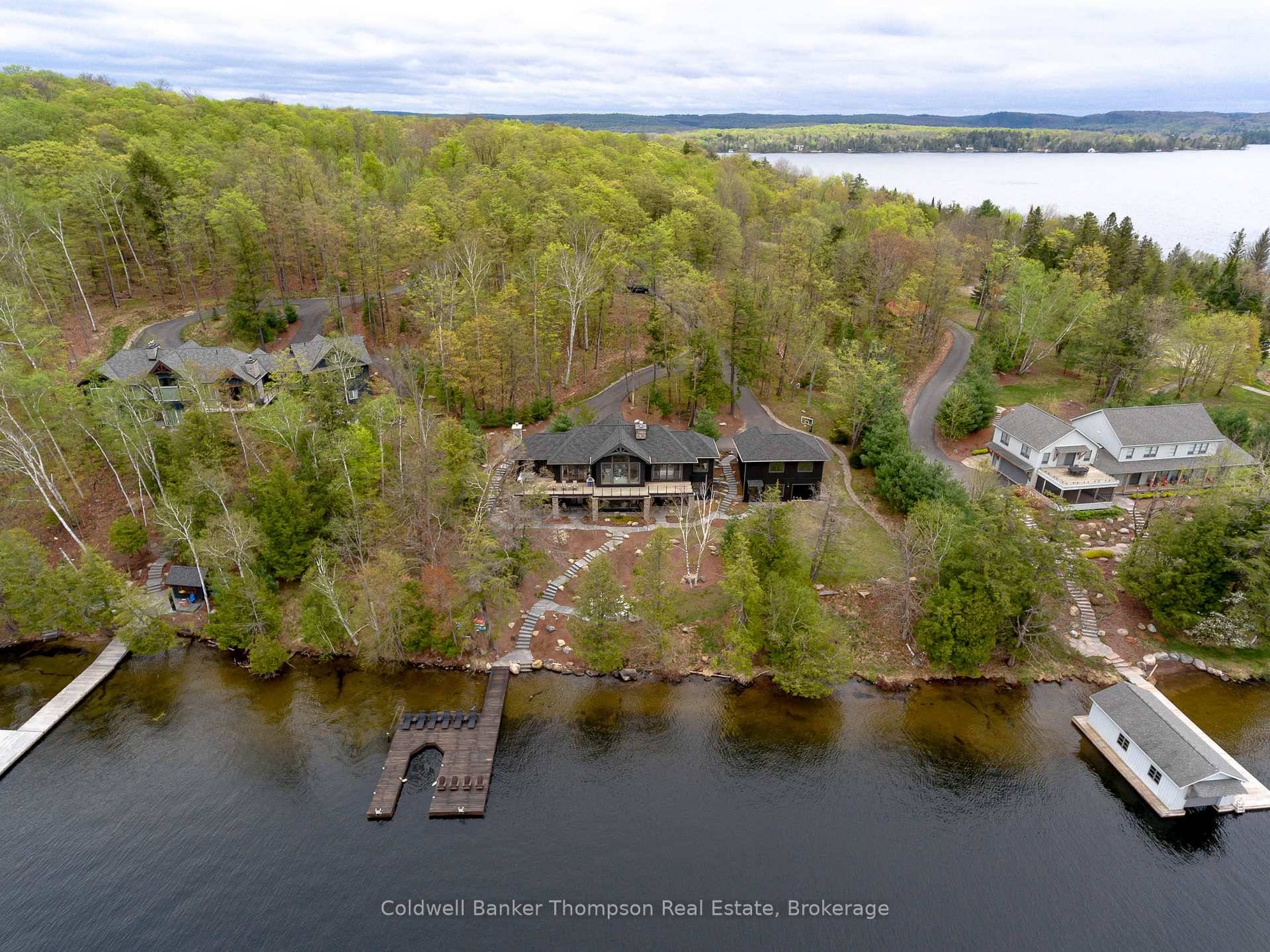 This exquisite Muskoka home or cottage on the shores of Peninsula Lake, crafted by South Mary Lake Contracting SML, offers timeless design and luxurious features on a coveted western exposure ...