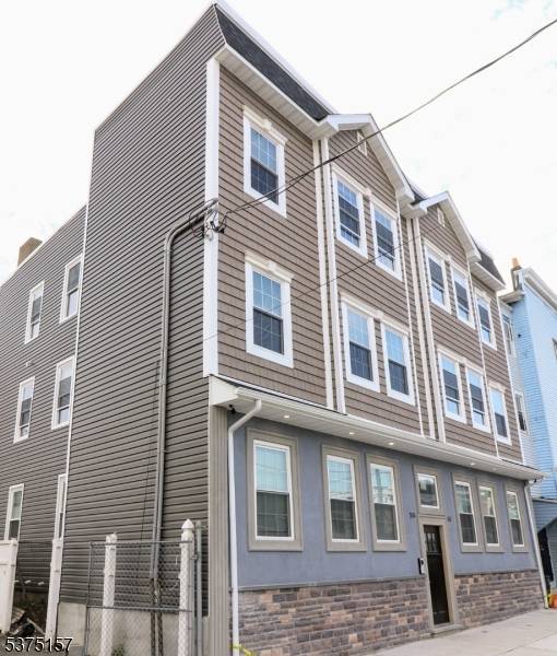 Investor Alert ! ! Don't miss this beautifully renovated 6 unit gem located right in the heart of Newark.
